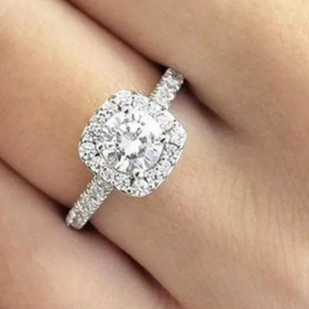 Round sapphire halo engagement ring silver
